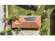 Aerial view of a home with solar panels at 4817 Sandy Glen Way, Wimauma, FL 33598