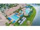 Resort-style community with pools,lap pool, tennis, and clubhouse at 4817 Sandy Glen Way, Wimauma, FL 33598