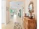 Open entryway looking toward the living room and kitchen at 4817 Sandy Glen Way, Wimauma, FL 33598