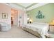 Main bedroom with ensuite bathroom and ample space at 4817 Sandy Glen Way, Wimauma, FL 33598
