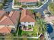 Aerial view of a house and its backyard patio area at 4943 Grand Oak Cir, Madeira Beach, FL 33708