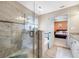 Bathroom with a large walk-in shower and tub at 4943 Grand Oak Cir, Madeira Beach, FL 33708