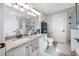Double vanity bathroom with granite countertop at 4943 Grand Oak Cir, Madeira Beach, FL 33708