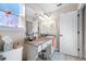Bathroom with granite vanity and single sink at 4943 Grand Oak Cir, Madeira Beach, FL 33708