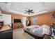 Comfortable bedroom with TV and ample closet space at 4943 Grand Oak Cir, Madeira Beach, FL 33708