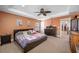 Bright bedroom featuring a king-size bed and dresser at 4943 Grand Oak Cir, Madeira Beach, FL 33708