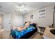 Bedroom with large stuffed animal and ceiling fan at 4943 Grand Oak Cir, Seminole, FL 33708