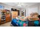 Bedroom with large stuffed animal and ceiling fan at 4943 Grand Oak Cir, Madeira Beach, FL 33708