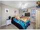 Bedroom with large stuffed animal and ceiling fan at 4943 Grand Oak Cir, Madeira Beach, FL 33708