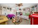 Entertainment area with TV, seating, and games at 4943 Grand Oak Cir, Madeira Beach, FL 33708