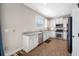 Modern kitchen featuring stainless steel appliances and ample counter space at 4943 Grand Oak Cir, Madeira Beach, FL 33708