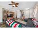 Living room with sectional sofa and hardwood floors at 4943 Grand Oak Cir, Madeira Beach, FL 33708