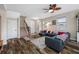 Living area with sectional sofa and hardwood floors at 4943 Grand Oak Cir, Madeira Beach, FL 33708