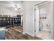 Home office features built-in shelving and hardwood floors at 4943 Grand Oak Cir, Madeira Beach, FL 33708