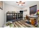 Home office with hardwood floors and ample storage at 4943 Grand Oak Cir, Madeira Beach, FL 33708