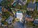 Aerial view of single-Gathering home with pool, located in a residential neighborhood at 8304 Sandstone Ct, Tampa, FL 33615