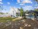 Large backyard with pool and house view at 8304 Sandstone Ct, Tampa, FL 33615