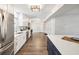 Modern kitchen with stainless steel appliances and white cabinets at 8304 Sandstone Ct, Tampa, FL 33615