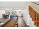 Modern kitchen with island, stainless steel appliances, and a view of dining area at 8304 Sandstone Ct, Tampa, FL 33615