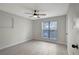 Light and airy bedroom featuring a ceiling fan at 10110 Winsford Oak Blvd # 612, Tampa, FL 33624