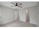 Bedroom with ceiling fan and ample closet space at 10110 Winsford Oak Blvd # 612, Tampa, FL 33624