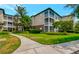 Building exterior with walkway and landscaping at 10110 Winsford Oak Blvd # 612, Tampa, FL 33624