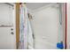 Simple bathroom with shower/tub combo and white tile at 1130 Barranca Ave, Spring Hill, FL 34609