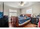 Bedroom with a wooden sleigh bed and neutral tones at 1130 Barranca Ave, Spring Hill, FL 34609