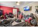 Bright bedroom with a double bed and motorcycle at 1130 Barranca Ave, Spring Hill, FL 34609