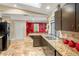 Spacious kitchen featuring granite countertops and ample cabinetry at 1130 Barranca Ave, Spring Hill, FL 34609
