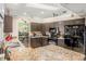 Kitchen with granite countertops and black appliances at 1130 Barranca Ave, Spring Hill, FL 34609