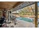Enclosed pool with workout equipment nearby at 1130 Barranca Ave, Spring Hill, FL 34609