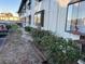 Multi-Gathering building featuring bay windows and green shrubbery at 1254 E 113Th Ave # C110, Tampa, FL 33612