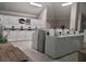 Modern laundry room with many machines at 1254 E 113Th Ave # C110, Tampa, FL 33612