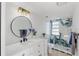 Spa-like bathroom with marble shower and modern vanity at 13182 72Nd Ter, Seminole, FL 33776