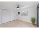 Spacious bedroom with white closet doors and hardwood floors at 13182 72Nd Ter, Seminole, FL 33776