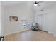 Spacious bedroom with vaulted ceilings, hardwood floors, and abundant natural light at 13182 72Nd Ter, Seminole, FL 33776