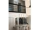 Modern kitchen with a breakfast bar and white cabinets at 13182 72Nd Ter, Seminole, FL 33776