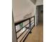 Open loft area overlooking living room with modern fireplace at 13182 72Nd Ter, Seminole, FL 33776