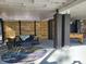 Covered patio features comfortable seating and a wood accent wall at 13182 72Nd Ter, Seminole, FL 33776