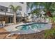 Inviting kidney-shaped pool surrounded by a spacious patio at 13182 72Nd Ter, Seminole, FL 33776