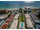 Aerial showing condo complex with pool and beach access at 19725 Gulf Blvd # 46, Indian Shores, FL 33785