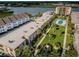 Aerial view of condo building and lush landscaping at 19725 Gulf Blvd # 46, Indian Shores, FL 33785