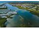 Aerial view of waterfront property and canal at 19725 Gulf Blvd # 46, Indian Shores, FL 33785