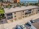 Aerial view of condo building with parking at 19725 Gulf Blvd # 46, Indian Shores, FL 33785