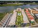 Aerial view of condo complex with pool and waterway access at 19725 Gulf Blvd # 46, Indian Shores, FL 33785