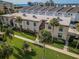 Aerial view of condo building and surrounding area at 19725 Gulf Blvd # 46, Indian Shores, FL 33785