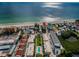 Aerial view of condo complex with pool and beach access at 19725 Gulf Blvd # 46, Indian Shores, FL 33785