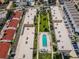Aerial view of condo complex with pool and courtyard at 19725 Gulf Blvd # 46, Indian Shores, FL 33785
