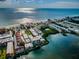 Aerial view of waterfront community with pool and beach access at 19725 Gulf Blvd # 46, Indian Shores, FL 33785